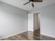 Bedroom with hardwood floors, and neutral paint with a door leading to another room at 3019 Havenwood Way, Stonecrest, GA 30038