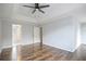 Primary bedroom with trey ceilings, hardwood floors, and ensuite bathroom at 3019 Havenwood Way, Stonecrest, GA 30038