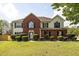 Beautiful two-story home with manicured front lawn and well-maintained landscaping at 3019 Havenwood Way, Stonecrest, GA 30038
