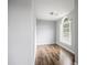 Well lit room with hardwood floors and a window that brings in natural light at 3019 Havenwood Way, Stonecrest, GA 30038