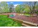Spacious backyard featuring a play area and lush lawn at 3570 W Hampton Nw Dr, Marietta, GA 30064