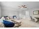 Cozy bonus room with comfortable seating and neutral carpet provides a relaxing space for entertainment at 3570 W Hampton Nw Dr, Marietta, GA 30064
