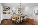 Dining room featuring built-in shelving and desk space, offers style and functionality for work or relaxation at 3570 W Hampton Nw Dr, Marietta, GA 30064