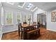 Bright dining area with skylights and hardwood floors offers a cozy eating space and natural light at 3570 W Hampton Nw Dr, Marietta, GA 30064
