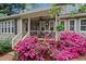 Charming home with a porch and blooming flowers at 3570 W Hampton Nw Dr, Marietta, GA 30064