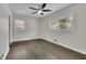 Well-lit bedroom features hardwood floors and large windows at 3983 E Hilda Cir, Decatur, GA 30035