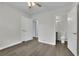 Bedroom featuring hardwood floors and access to a private bathroom at 3983 E Hilda Cir, Decatur, GA 30035