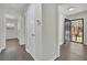 Bright hallway showcasing wood floors and neutral paint, seamlessly connecting the home's living spaces at 3983 E Hilda Cir, Decatur, GA 30035