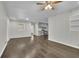 Inviting living room with hardwood floors, access to kitchen, and recessed lighting at 3983 E Hilda Cir, Decatur, GA 30035