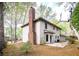 Rear exterior of home with spacious backyard for outdoor enjoyment at 746 Oak Terrace Ter, Norcross, GA 30071
