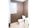 Small bathroom with a toilet and white vanity at 746 Oak Terrace Ter, Norcross, GA 30071