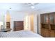 Bedroom featuring a large dresser, closet and an ensuite bathroom at 746 Oak Terrace Ter, Norcross, GA 30071