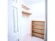 Walk-in closet with built-in shelving and ample storage space at 746 Oak Terrace Ter, Norcross, GA 30071