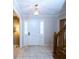 Inviting foyer featuring light tile floors, a classic white door, and traditional chandelier at 746 Oak Terrace Ter, Norcross, GA 30071
