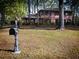 Brick home showcasing a well-maintained lawn and charming mailbox at 746 Oak Terrace Ter, Norcross, GA 30071