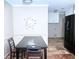 Kitchenette and breakfast nook with modern black appliances; great tile flooring throughout at 746 Oak Terrace Ter, Norcross, GA 30071