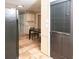 Kitchenette featuring modern black appliances, plenty of white cabinetry and tile floors at 746 Oak Terrace Ter, Norcross, GA 30071