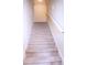 Carpeted stairway with white handrail leading to upper level at 746 Oak Terrace Ter, Norcross, GA 30071