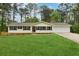 Charming single story home with a sprawling front lawn and a two car garage at 756 Butler Ct, Lawrenceville, GA 30044