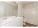 Bright bathroom features a double sink vanity, tub, and tiled shower at 2168 Sugar Maple Nw Cv, Acworth, GA 30101