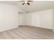 Neutral bedroom with carpet, double closet, and a ceiling fan for comfort at 2168 Sugar Maple Nw Cv, Acworth, GA 30101
