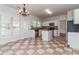 Eat-in kitchen featuring white cabinets, granite counters, and stainless steel appliances at 2168 Sugar Maple Nw Cv, Acworth, GA 30101