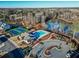 Aerial view of community amenities: pool, tennis courts, playground, and pond at 234 Fieldbrook Xing, Canton, GA 30115