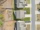 Aerial view of the property showing its layout within the neighborhood and including its backyard at 234 Fieldbrook Xing, Canton, GA 30115