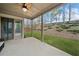 View from covered patio looking onto a landscaped backyard with a hillside at 234 Fieldbrook Xing, Canton, GA 30115