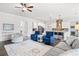 Spacious living room open to the kitchen with stainless appliances and an adjacent butler's pantry at 234 Fieldbrook Xing, Canton, GA 30115
