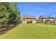 Extensive backyard featuring an outdoor patio and spacious lawns at 2369 Apalachee Crucis Ln, Dacula, GA 30019