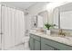 Well-lit bathroom features double vanity, modern fixtures, and shower/tub combo at 2500 Grand Manor Ct, Marietta, GA 30068