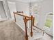 View from the top of the stairs to the foyer of a home with arched windows and neutral decor at 2500 Grand Manor Ct, Marietta, GA 30068