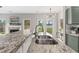 Spacious kitchen island with a stainless steel sink and granite countertops at 2500 Grand Manor Ct, Marietta, GA 30068