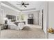Large main bedroom featuring a ceiling fan, carpeted floor, and plenty of space at 2500 Grand Manor Ct, Marietta, GA 30068