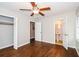 Spacious bedroom with ceiling fan and ensuite bathroom at 3773 Sarahs Ln, Tucker, GA 30084
