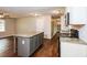Modern kitchen with granite countertops, stainless steel appliances, and a center island at 3773 Sarahs Ln, Tucker, GA 30084