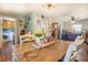 Charming dining area features a large table and an open view to the laundry room at 3557 Bill Gardner Pkwy, Locust Grove, GA 30248