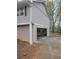 Attached garage with an open door, showing ample space for parking and storage at 5251 Greenpoint Dr, Stone Mountain, GA 30088