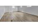 This open basement space provides a blank canvas with modern floors and ample square footage at 149 Roy Huie Rd, Riverdale, GA 30274
