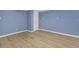 Basement view showcasing painted walls and new floors at 149 Roy Huie Rd, Riverdale, GA 30274