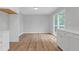 Bright dining room featuring wood flooring and sliding glass door that provides lots of natural light at 149 Roy Huie Rd, Riverdale, GA 30274