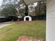 Spacious backyard with a shed and covered parking at 1506 Ravenel Rd, Conley, GA 30288