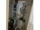 Small bathroom with toilet, shelving, and decor at 1506 Ravenel Rd, Conley, GA 30288