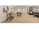Spacious finished basement with entertainment area and bar, perfect for gatherings at 4457 Equity Ct, Ellenwood, GA 30294