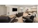 Finished basement featuring a cozy seating area, pool table, and modern decor at 4457 Equity Ct, Ellenwood, GA 30294