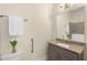 Bathroom with granite counters, a mirror, and a combination toilet/washer-dryer at 4457 Equity Ct, Ellenwood, GA 30294