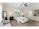 Spacious bedroom with a comfortable bed, soft lighting, and neutral color scheme creating a relaxing retreat at 4457 Equity Ct, Ellenwood, GA 30294