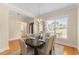 Bright dining area featuring a modern chandelier and ample natural light at 4457 Equity Ct, Ellenwood, GA 30294