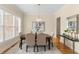 Dining room featuring modern decor and a large window providing plenty of light at 4457 Equity Ct, Ellenwood, GA 30294